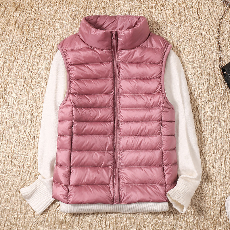 Josephe | Ny vest med hvide andefjer