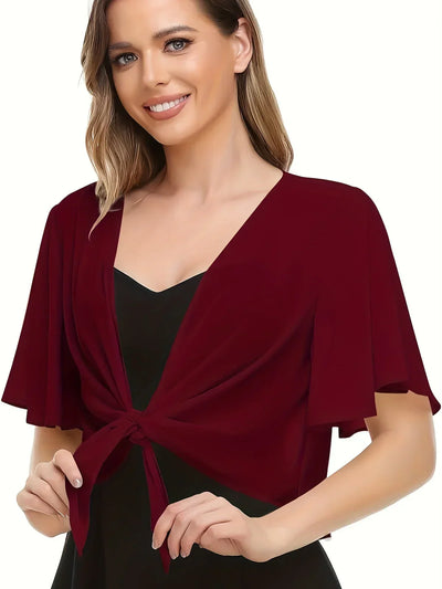 Thilde | Elegant og Stilfuld Omslagsbluse" can be rewritten as:

"Thilde | Chic and Stylish Wrap Blouse