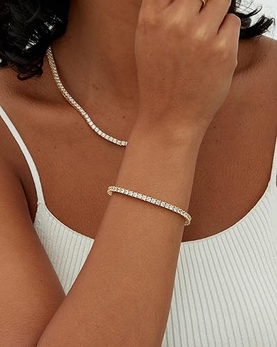 Guldt tennis armbånd