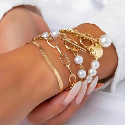 Elegant 4-delt armbåndsæt i guld – Slange, perler & led