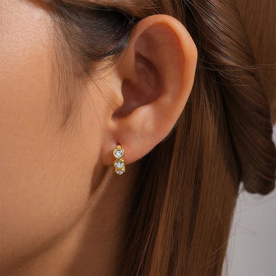 Hjerteformede creoler med zirkonia – Joycee