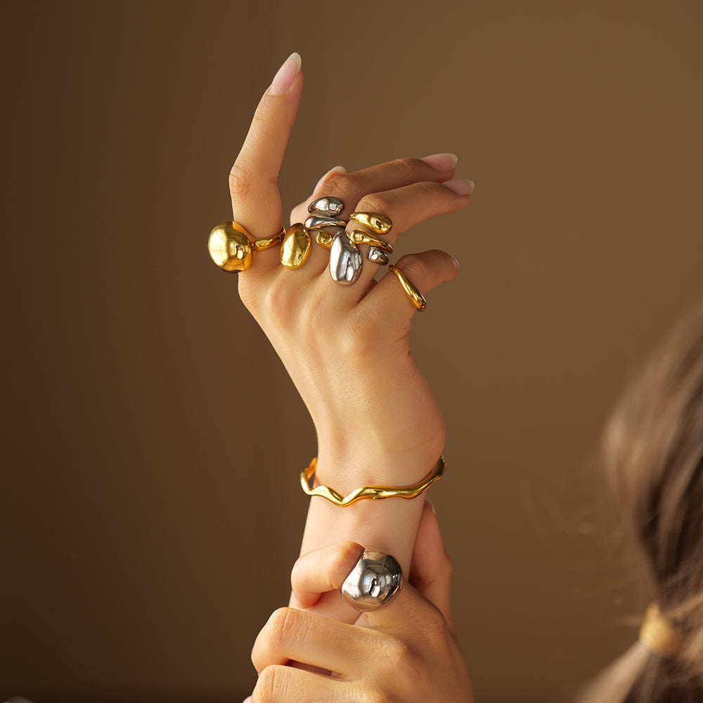 Elegant gylden kugleformet ring – Alfraye