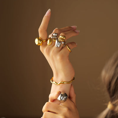 Elegant gylden kugleformet ring – Alfraye