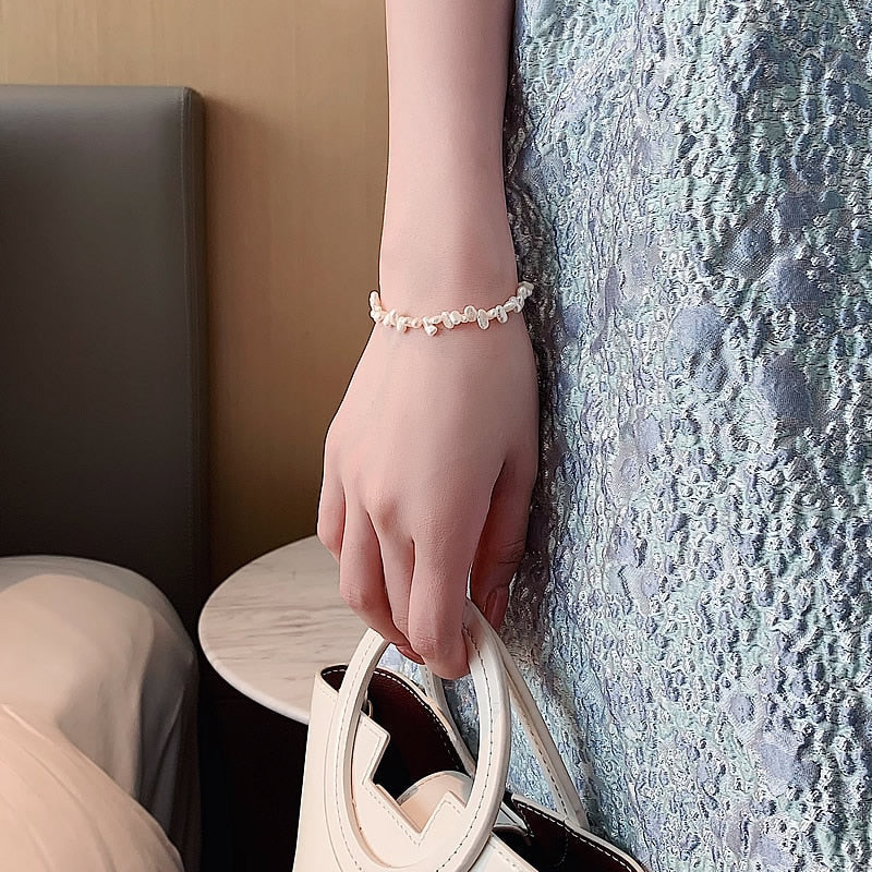 Elegant perlearmbånd fra Céline - tilføj luksus til din stil