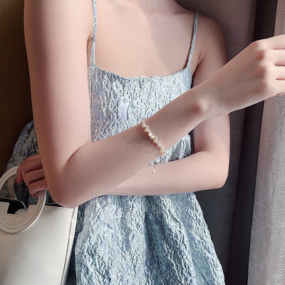 Elegant perlearmbånd fra Céline - tilføj luksus til din stil