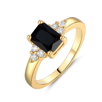 Guld Baguette Ring med Sort Spinel
