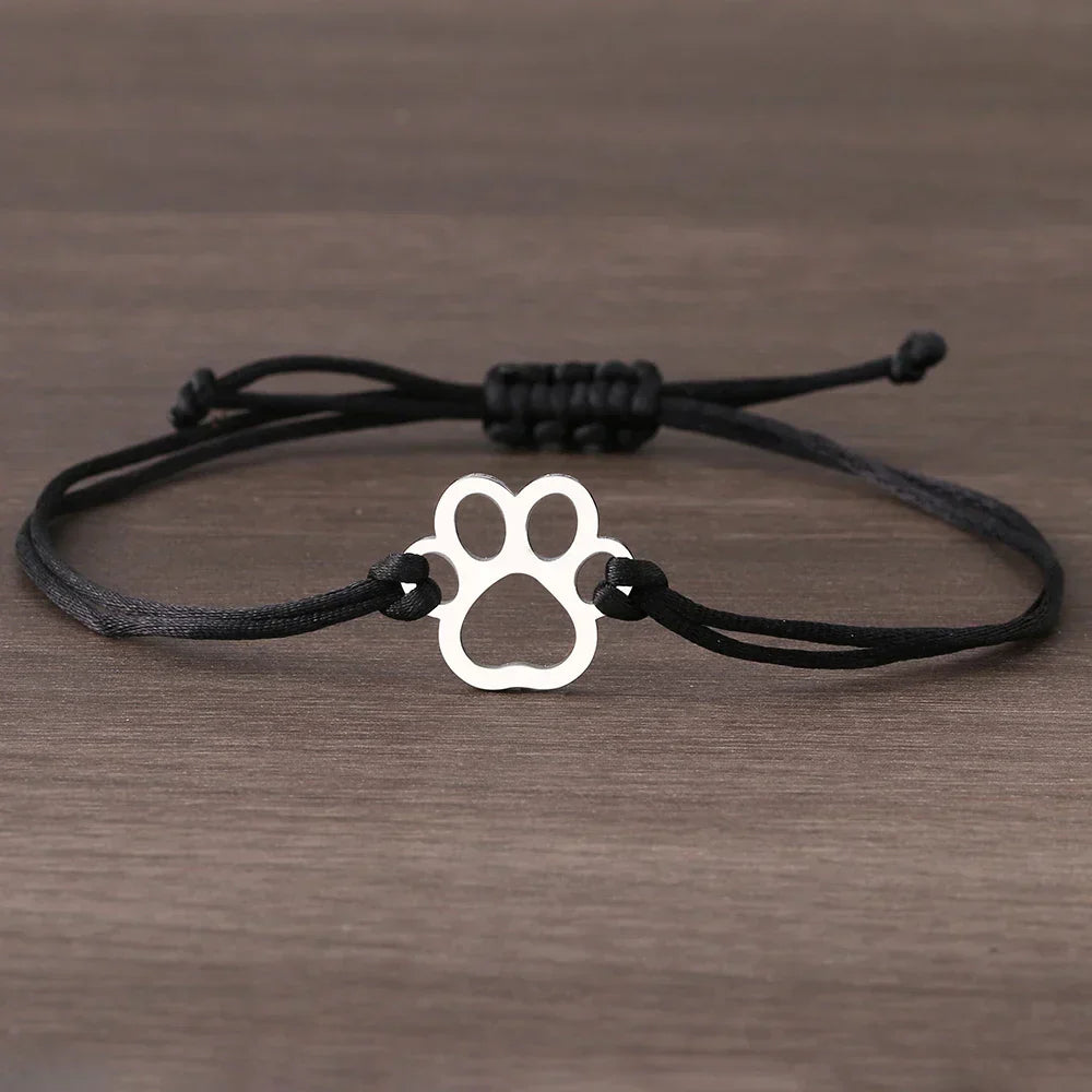 PawPrint Twist – Justerbar Sort & Rød Armbånd