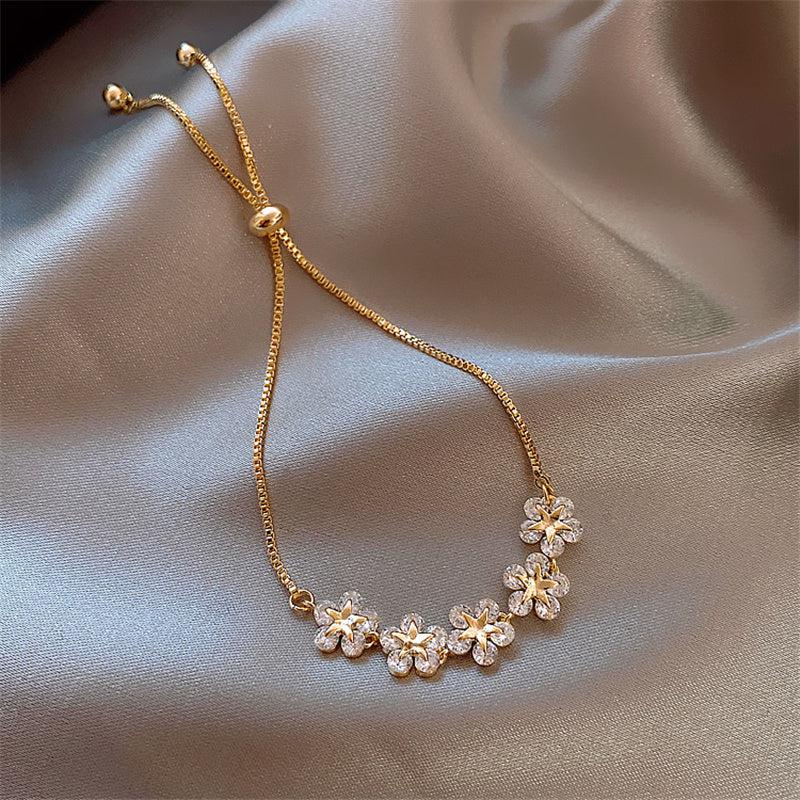 Armbånd Krystal Daisy i Guld