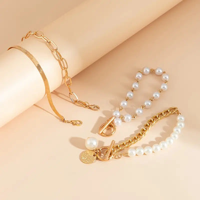 Elegant 4-delt armbåndsæt i guld – Slange, perler & led