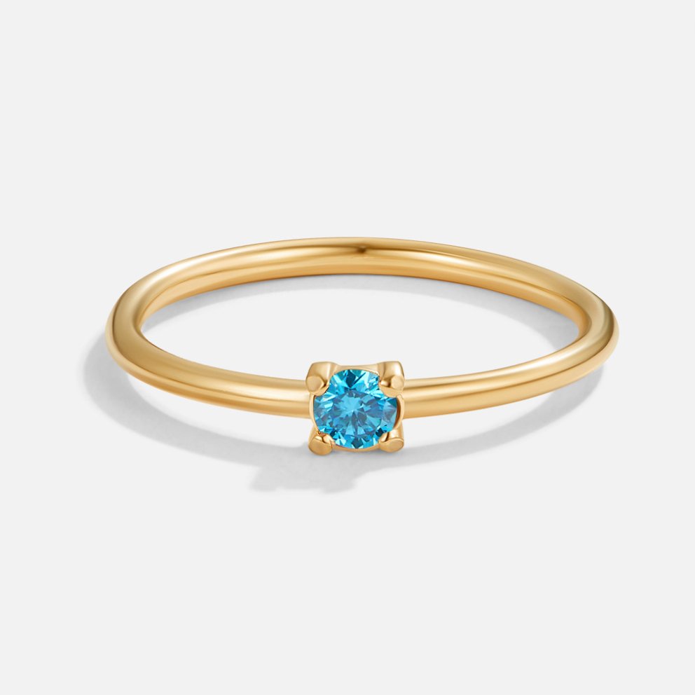 Guld ring med fødselssten