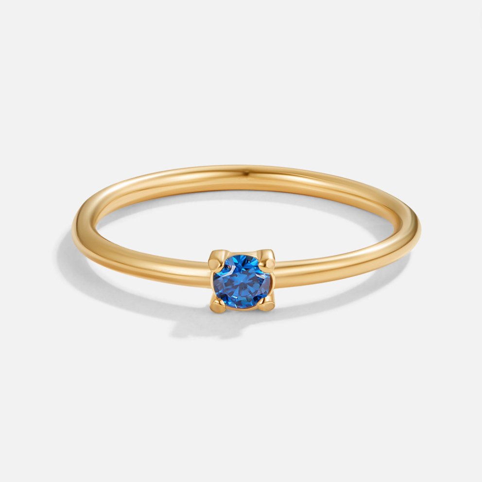 Guld ring med fødselssten