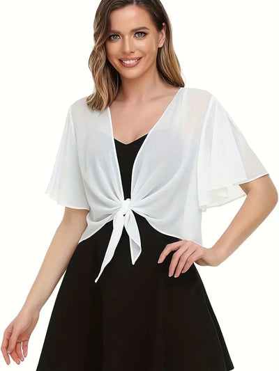 Thilde | Elegant og Stilfuld Omslagsbluse" can be rewritten as:

"Thilde | Chic and Stylish Wrap Blouse