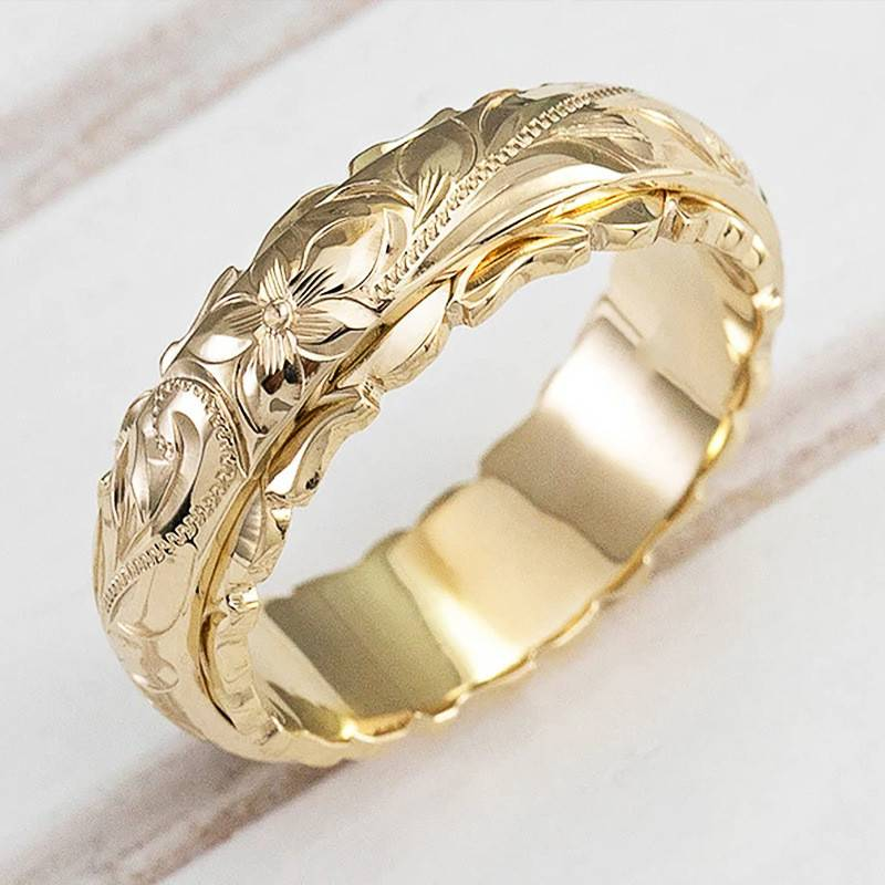 Elegant Vintage Ring i Guld med Blomsterdesign - Stilfuld og Klassisk Ring